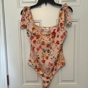 Lush Floral Bodysuit with Pink and Orange Accents